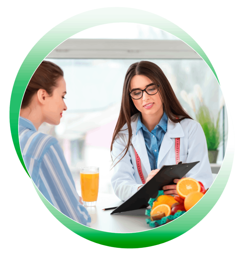 Doctor discussing with patient while drinking orange juice